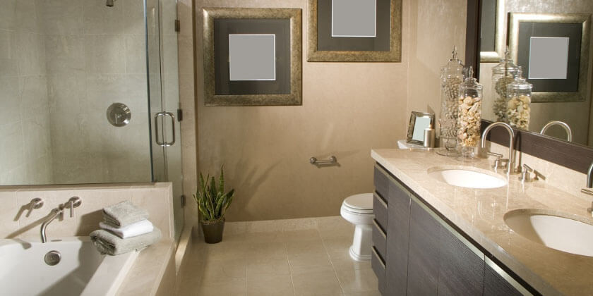 Modern bathroom interior constructed by a leading Boston contractor, featuring a bathtub, walk-in shower, and double vanity.